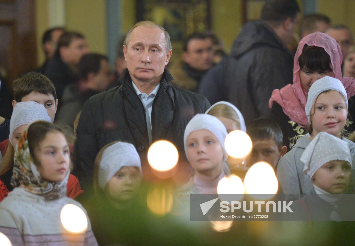 President Vladimir Putin attends a Christmas service