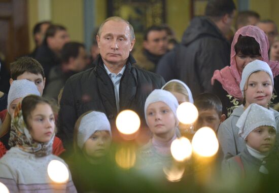 President Vladimir Putin attends a Christmas service