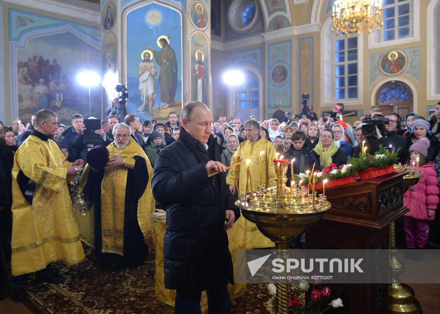 President Vladimir Putin attends a Christmas service