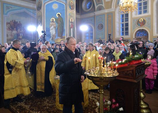 President Vladimir Putin attends a Christmas service