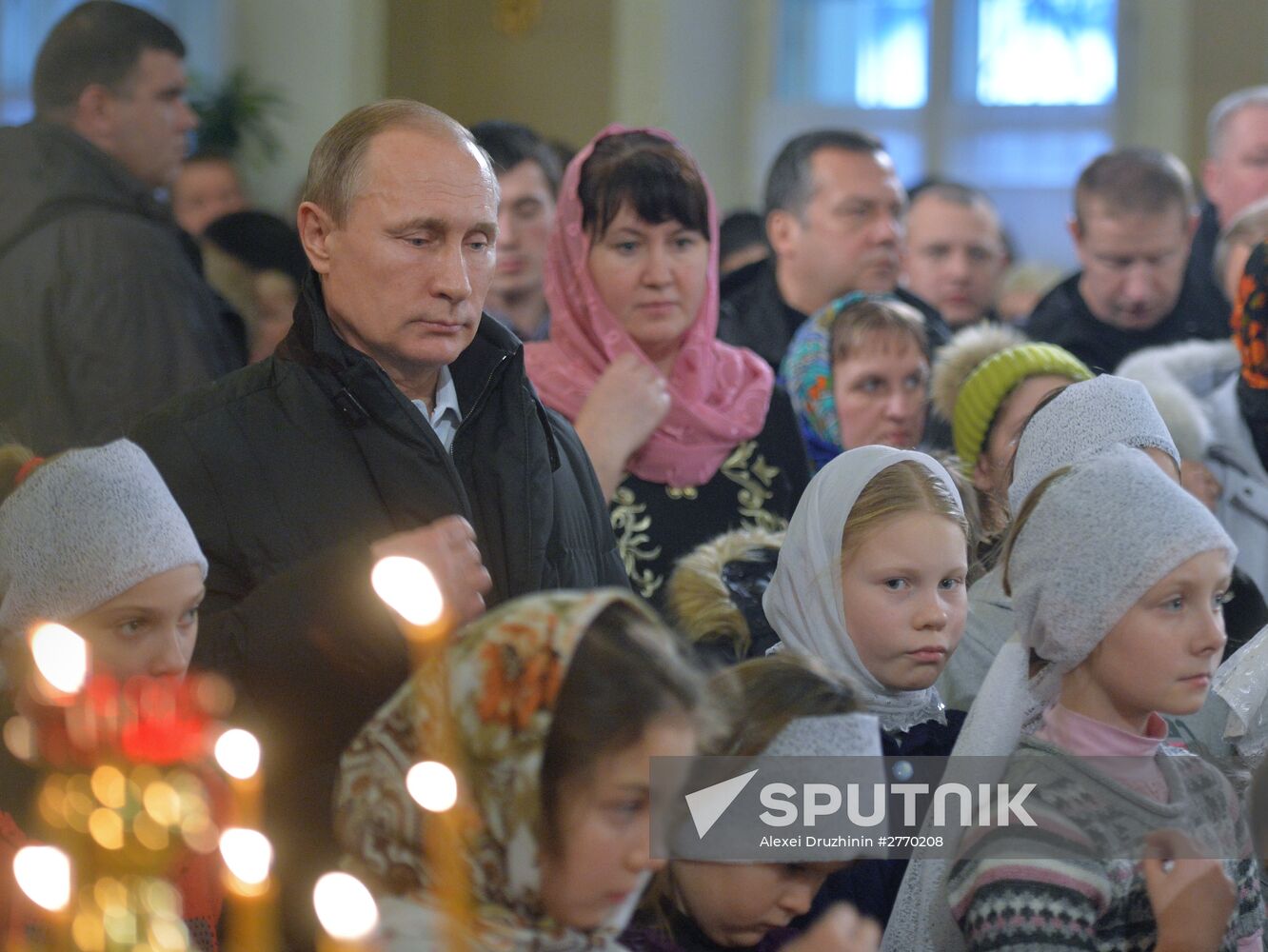 President Vladimir Putin attends a Christmas service