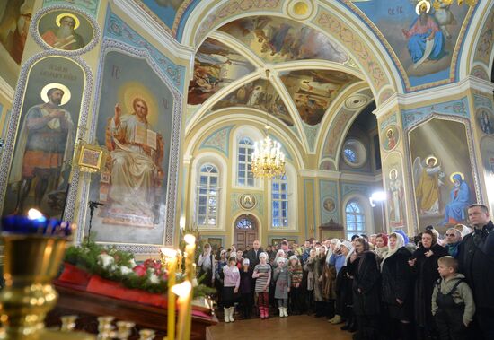 President Vladimir Putin attends a Christmas service