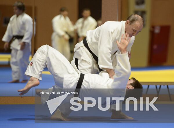 President Vladimir Putin meets with Russian judo national team members