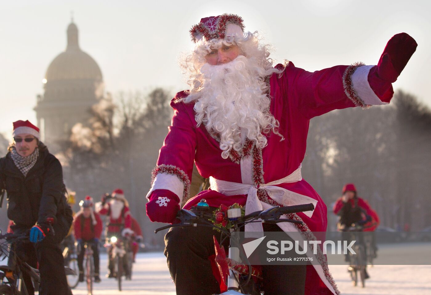 St. Petersburg's annual bicycle parade featuring Fathers Frost and Snow Maidens