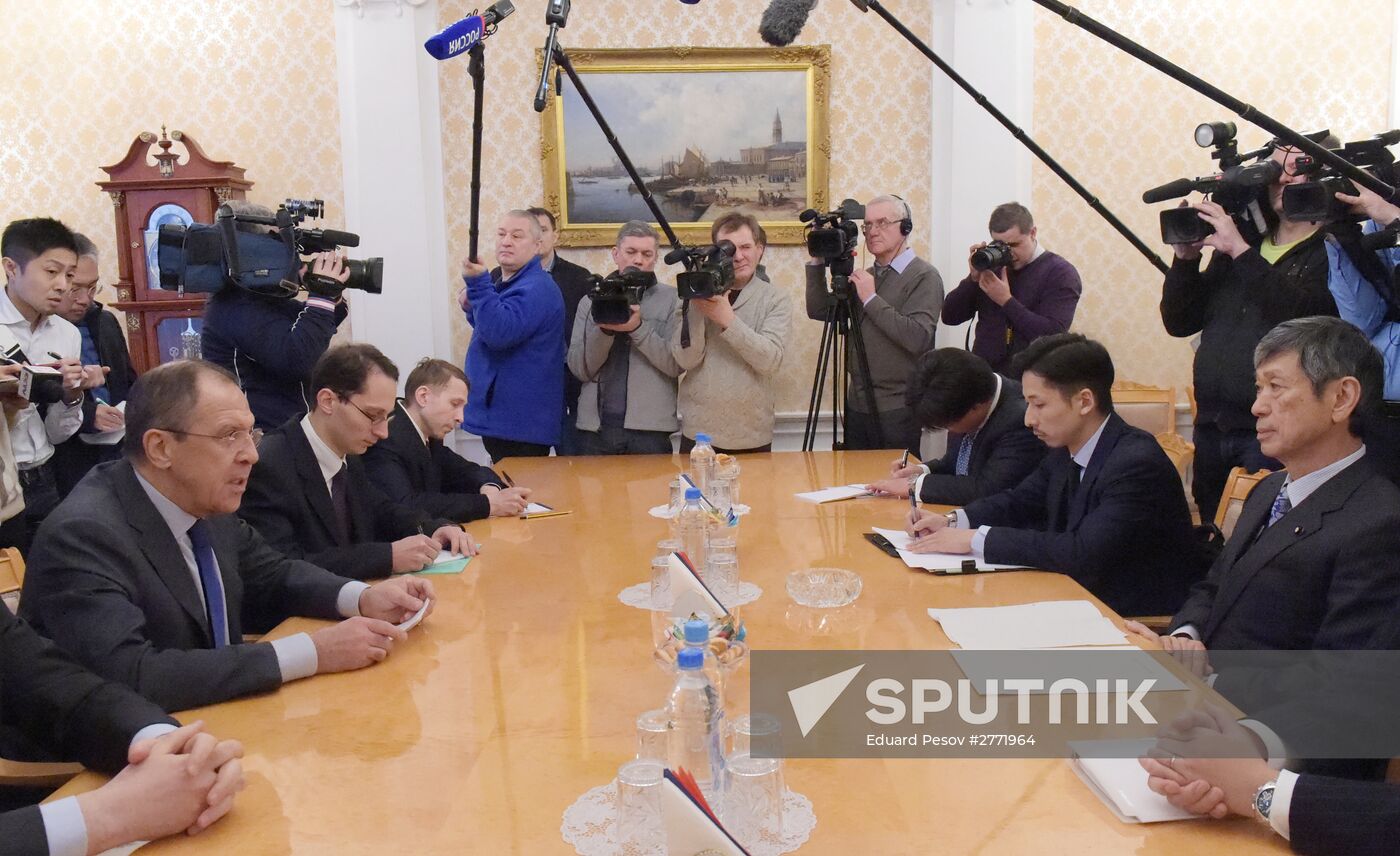 Russian Foreign Minister Sergey Lavrov meets with former Japanese Foreign Minister Masahiko Komura in Moscow.