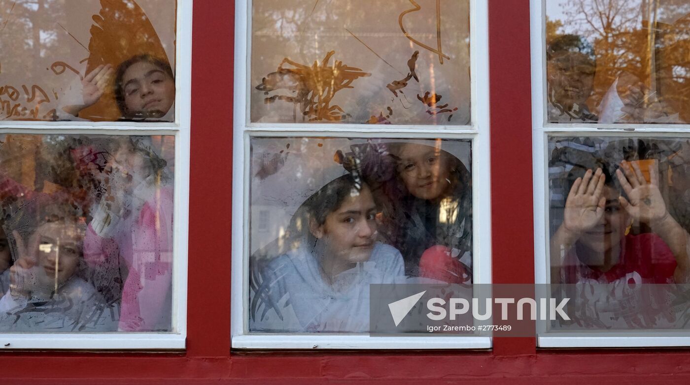 Children of refugees from Syria, Afghanistan in class in German school