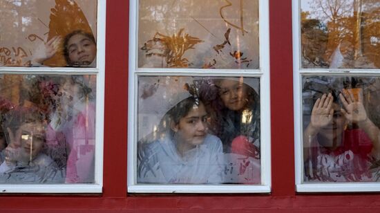 Children of refugees from Syria, Afghanistan in class in German school