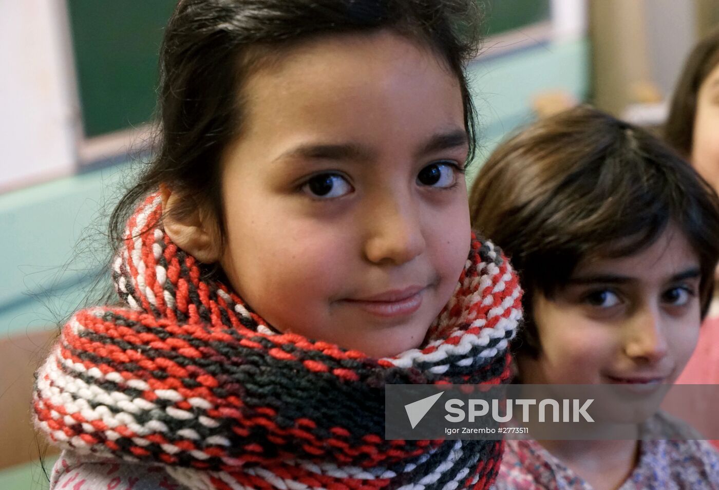 Children of refugees from Syria, Afghanistan in class in German school