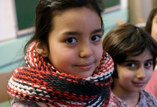 Children of refugees from Syria, Afghanistan in class in German school