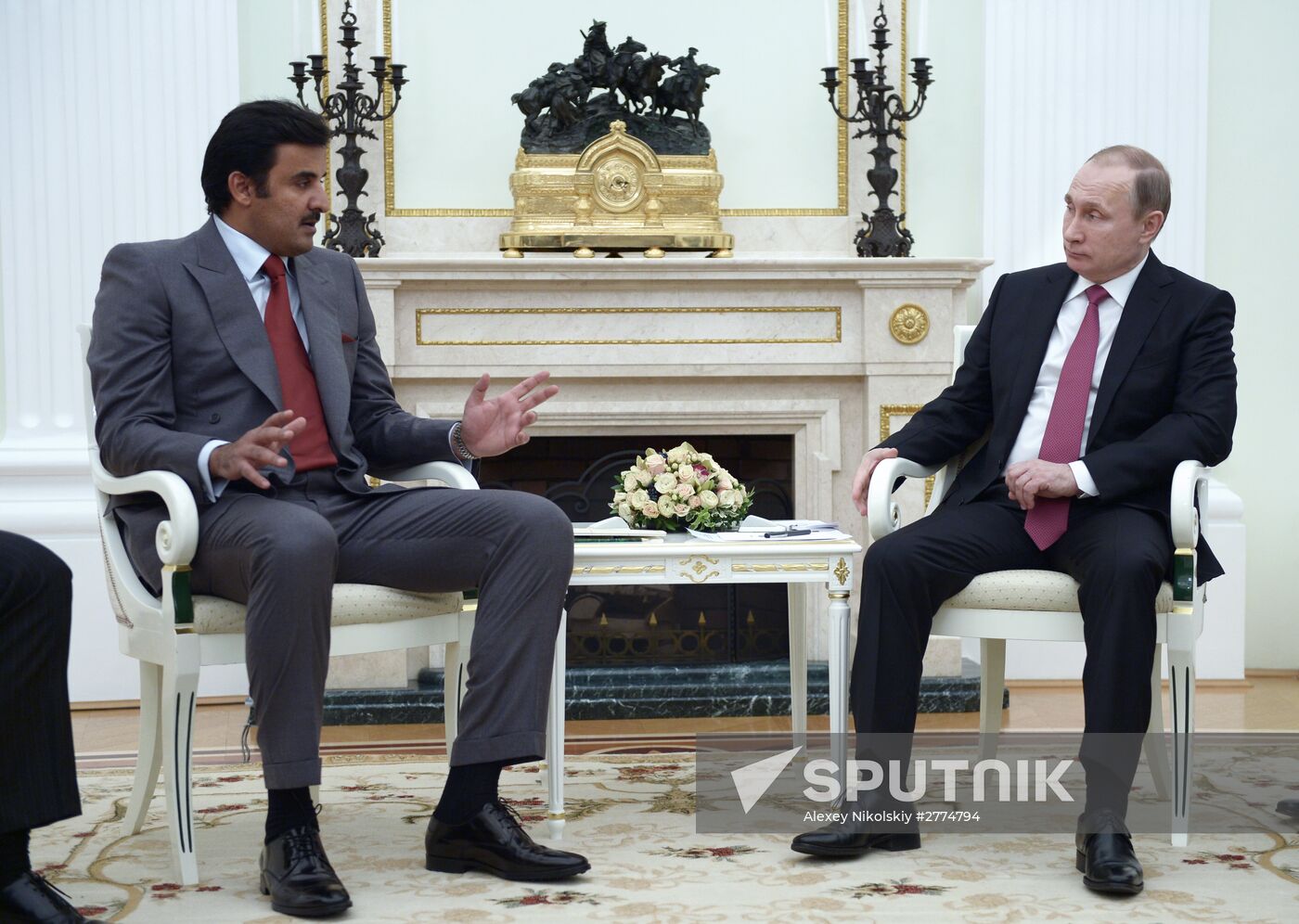 President Vladimir Putin meets with Qatar Emir Tamim bin Hamad Al-Thani