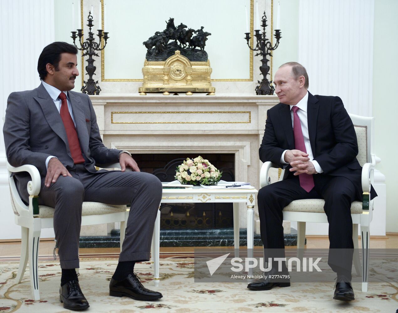 President Vladimir Putin meets with Qatar Emir Tamim bin Hamad Al-Thani