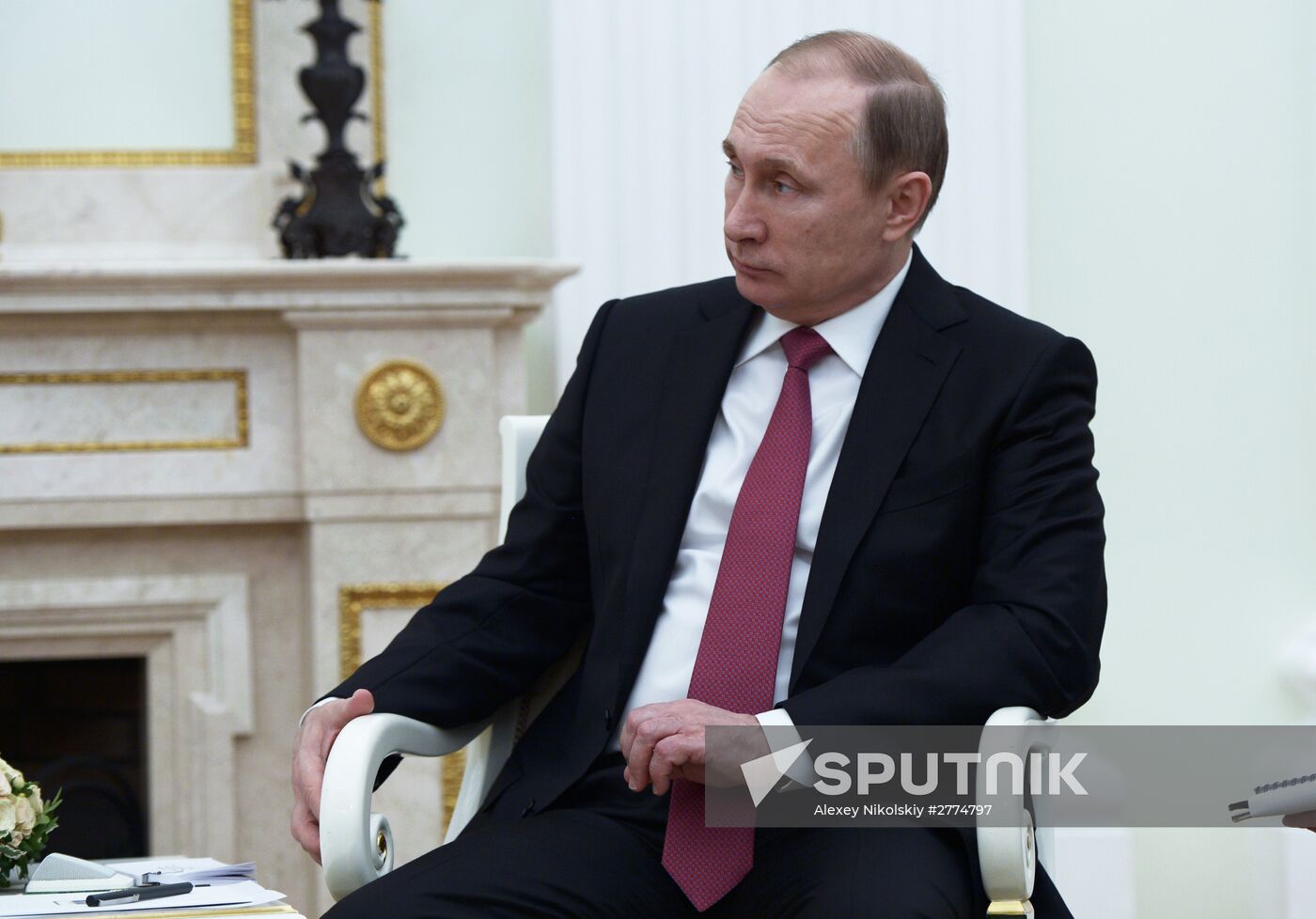 President Vladimir Putin meets with Qatar Emir Tamim bin Hamad Al-Thani
