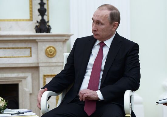 President Vladimir Putin meets with Qatar Emir Tamim bin Hamad Al-Thani