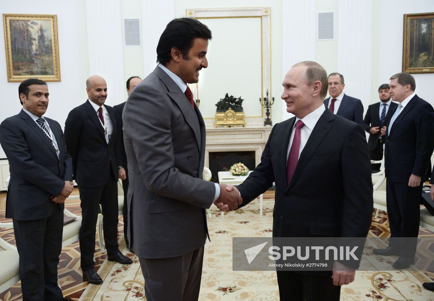 President Vladimir Putin meets with Qatar Emir Tamim bin Hamad Al-Thani