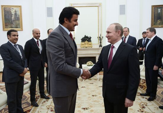 President Vladimir Putin meets with Qatar Emir Tamim bin Hamad Al-Thani