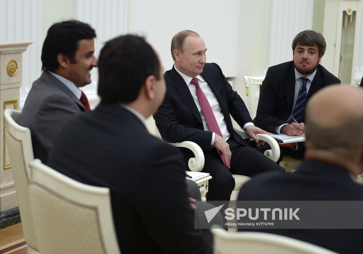 President Vladimir Putin meets with Qatar Emir Tamim bin Hamad Al-Thani