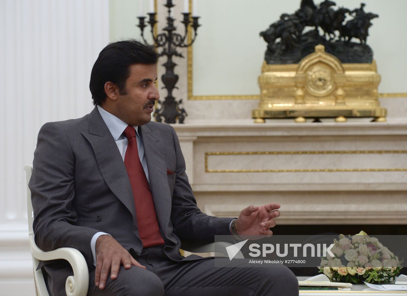 President Vladimir Putin meets with Qatar Emir Tamim bin Hamad Al-Thani