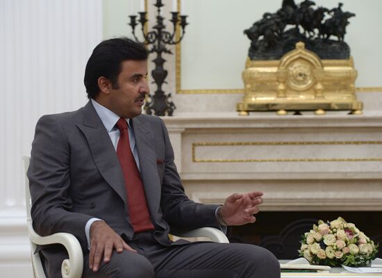 President Vladimir Putin meets with Qatar Emir Tamim bin Hamad Al-Thani