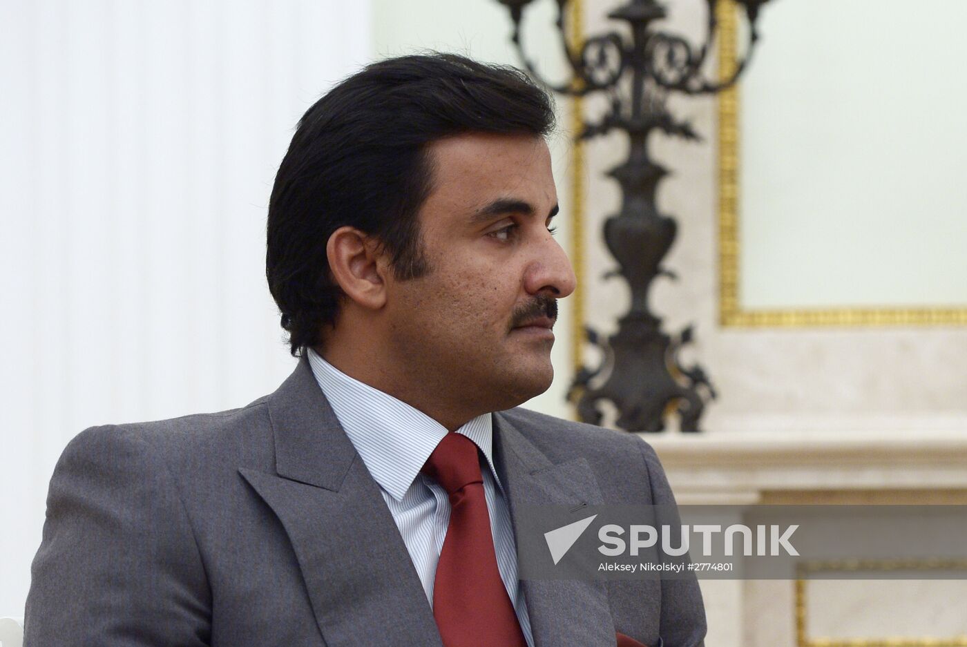 President Vladimir Putin meets with Qatar Emir Tamim bin Hamad Al-Thani