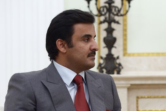 President Vladimir Putin meets with Qatar Emir Tamim bin Hamad Al-Thani