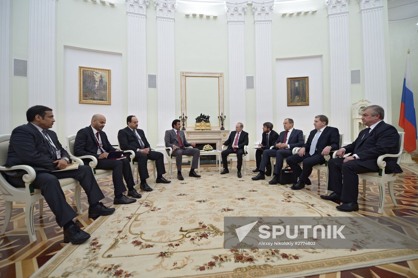 President Vladimir Putin meets with Qatari Emir Tamim bin Hamad Al-Thani