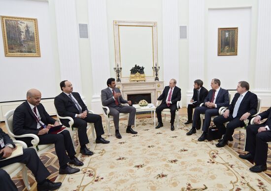 President Vladimir Putin meets with Qatar Emir Tamim bin Hamad Al-Thani