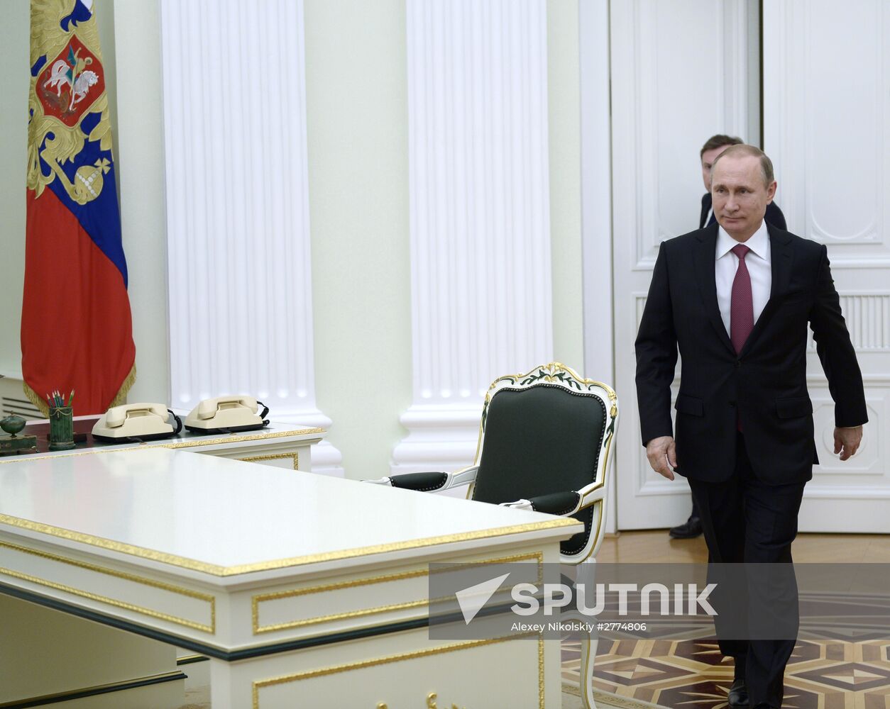 President Vladimir Putin meets with Qatar Emir Tamim bin Hamad Al-Thani
