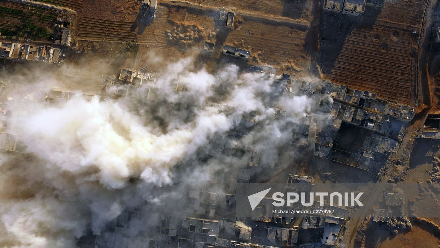 Syrian army fights in Syria's Darayya