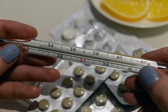 Medicine and thermometer