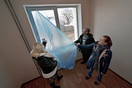 Opening of new houses built as part of the program to relocate people from run-down buildings in Vladivostok