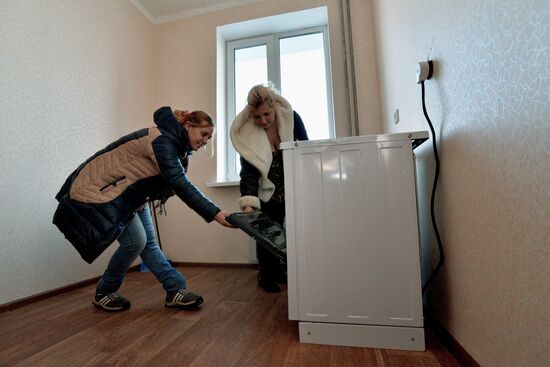 Opening of new houses built as part of the program to relocate people from run-down buildings in Vladivostok
