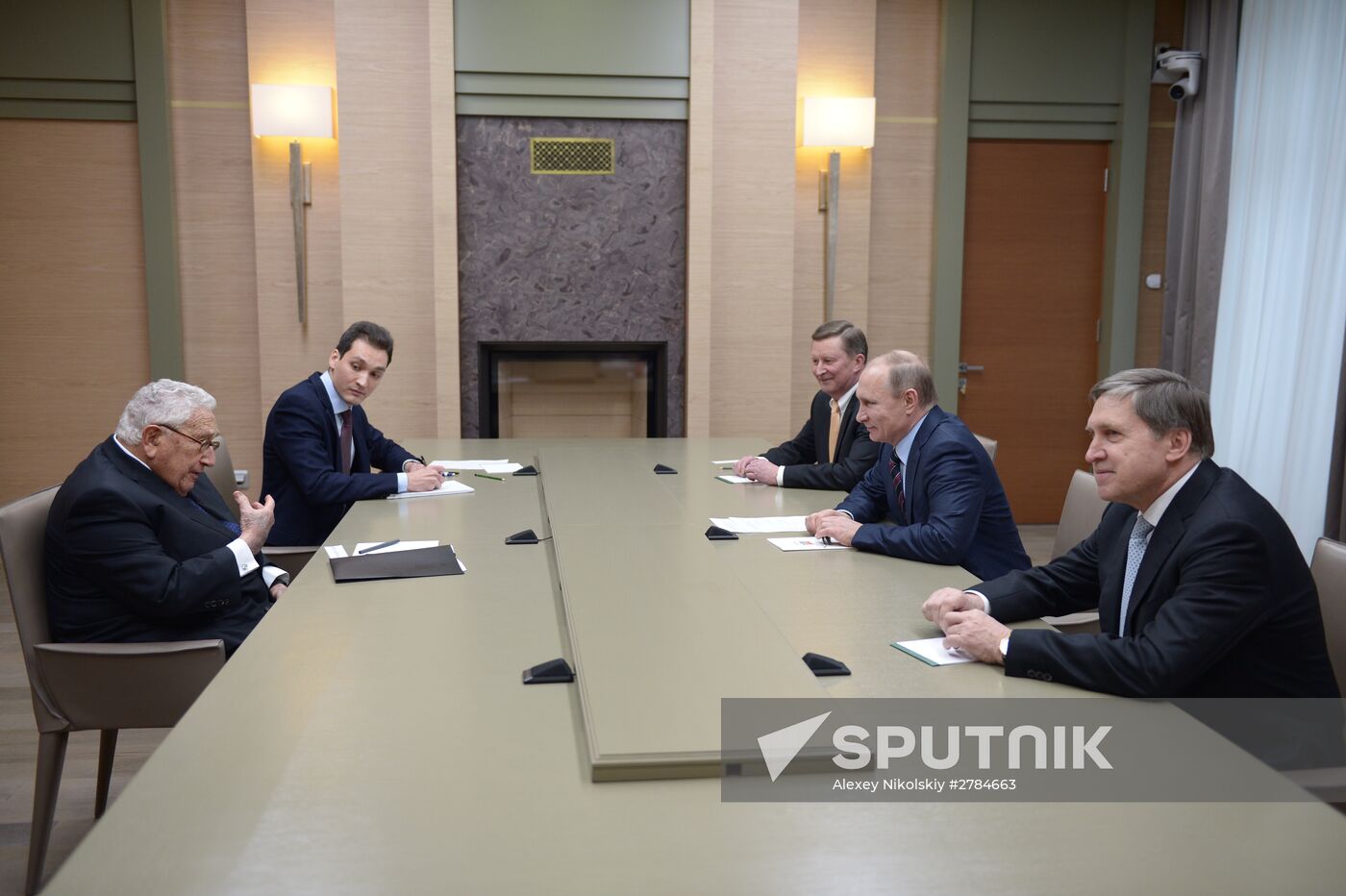 Russian President Vladimir Putin's meeting with former U.S. Secretary of State Henry Kissinger