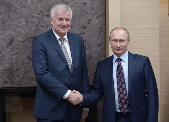 Russian President Vladimir Putin meets with Minister-President of Bavaria Horst Seehofer