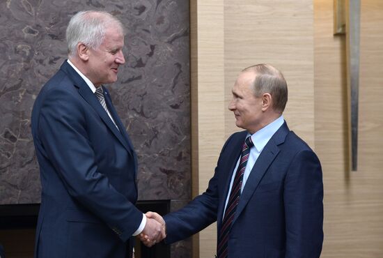 Russian President Vladimir Putin meets with Minister-President of Bavaria Horst Seehofer