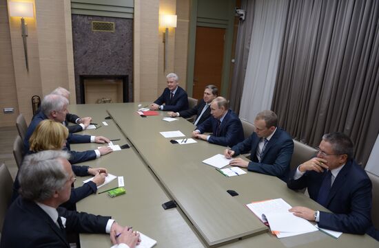 Russian President Vladimir Putin meets with Minister-President of Bavaria Horst Seehofer