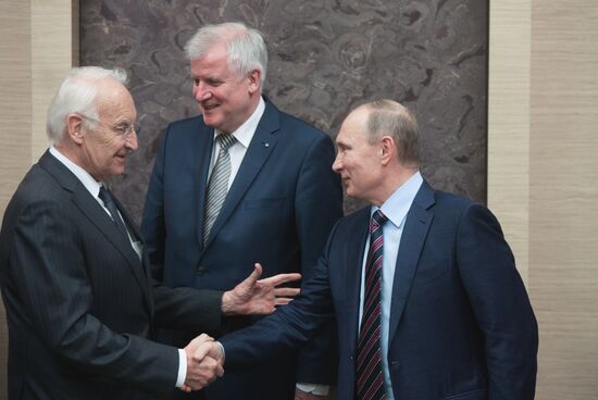 Russian President Vladimir Putin meets with Minister-President of Bavaria Horst Seehofer