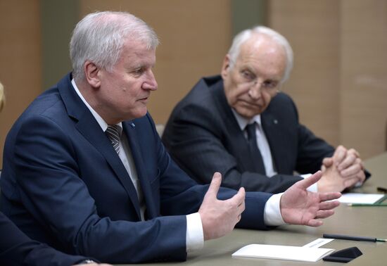 Russian President Vladimir Putin meets with Minister-President of Bavaria Horst Seehofer