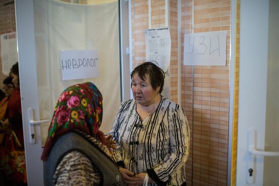 Omsk Surgery Clinic's mobile medical team in Litovka town