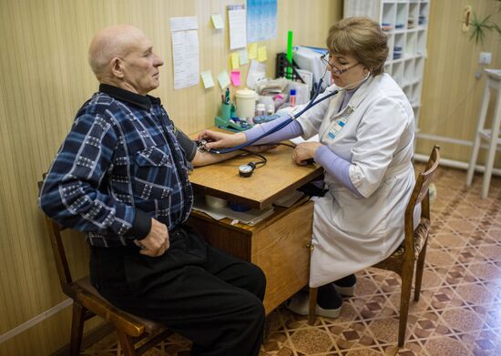 Omsk Surgery Clinic's mobile medical team in Litovka town