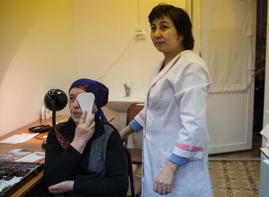 Omsk Surgery Clinic's mobile medical team in Litovka town