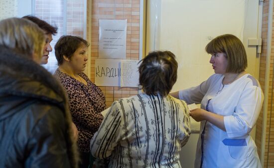 Omsk Surgery Clinic's mobile medical team in Litovka town