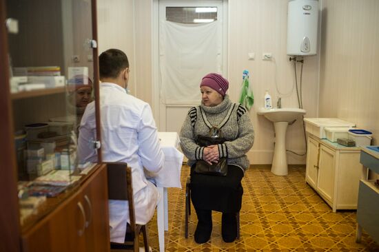 Omsk Surgery Clinic's mobile medical team in Litovka town