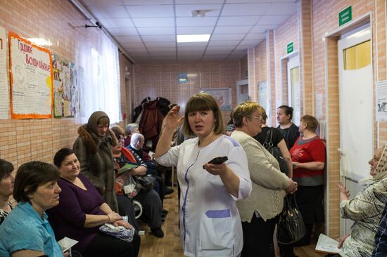 Omsk Surgery Clinic's mobile medical team in Litovka town
