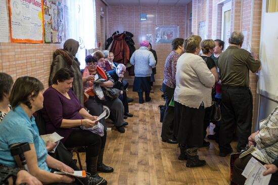Omsk Surgery Clinic's mobile medical team in Litovka town