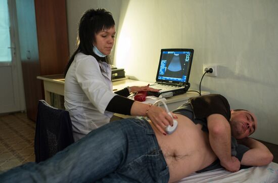 Omsk Surgery Clinic's mobile medical team in Litovka town