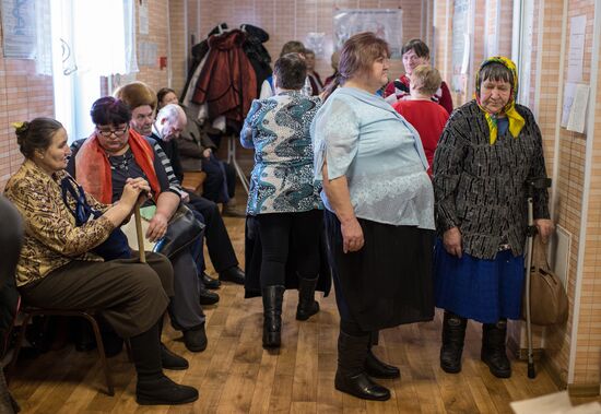 Omsk Surgery Clinic's mobile medical team in Litovka town
