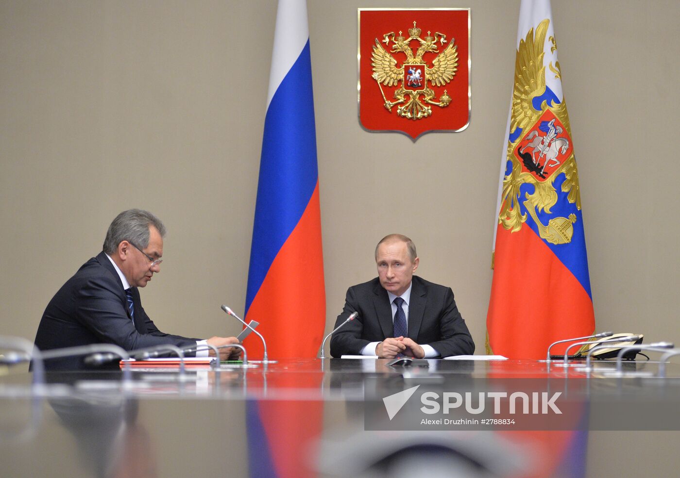 President Vladimir Putin receives reports on battleworthiness of South Military District forces