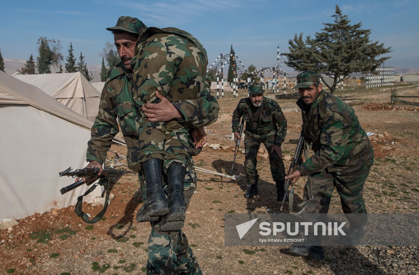 Syrian army volunteers trained outside Damascus