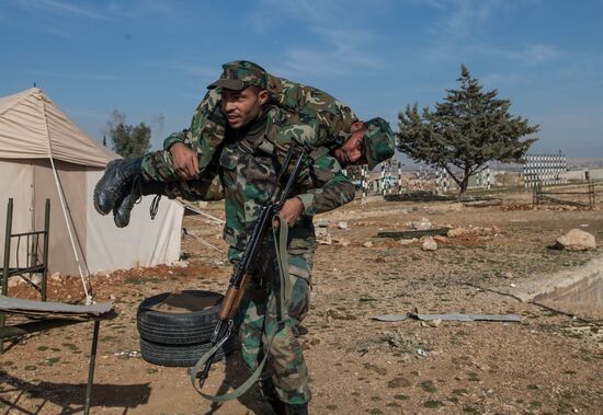 Syrian army volunteers trained outside Damascus