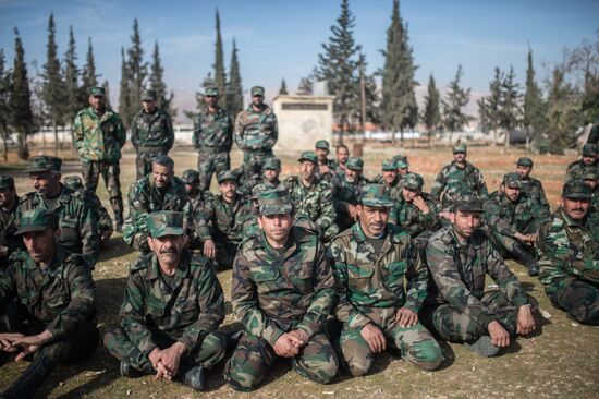 Syrian army volunteers trained outside Damascus